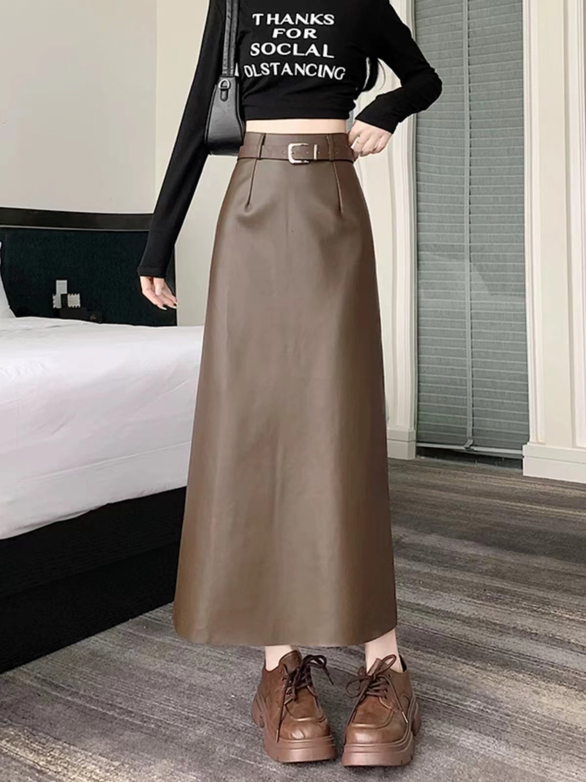 Long leather skirt with belt & back slit