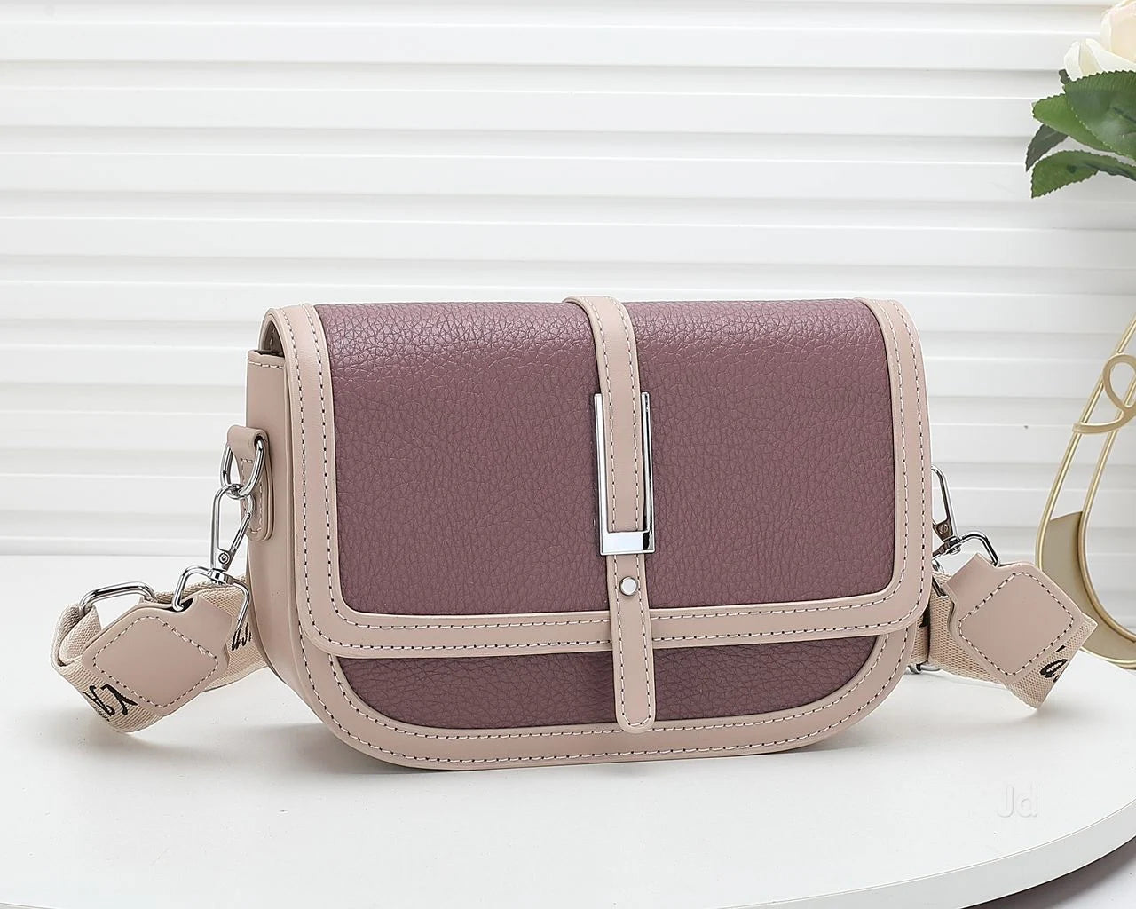 Flap open sling bag wit cross body strap